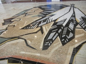 Sioux logo inlaid in polished granite flooring