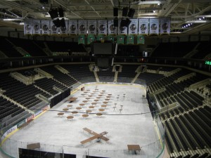 Ralph Englestad Arena (preparing for a wedding rehearsal dinner); note all the national (green) and league (white) championship banners