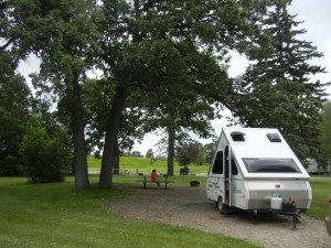 camping in the Red River greenway (note flood dyke in the background)