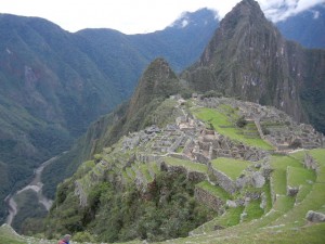 Machu Picchu archaeological site, with Huayna Picchu mountain behind and the Vilcanota River far below to the left