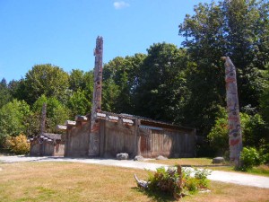 house and totem poles