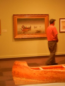 Dick perusing the Romancing the Canoe exhibit in the Glanbow museum